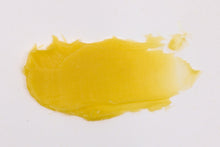 A photo showing the texture of Aura Face Balm.