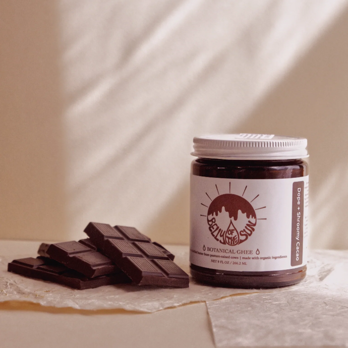jar of cacao ghee with chocolate squares