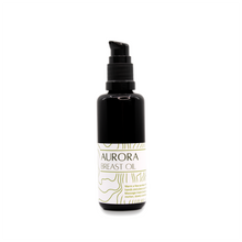 Bottle of Aurora Breast Oil on white background
